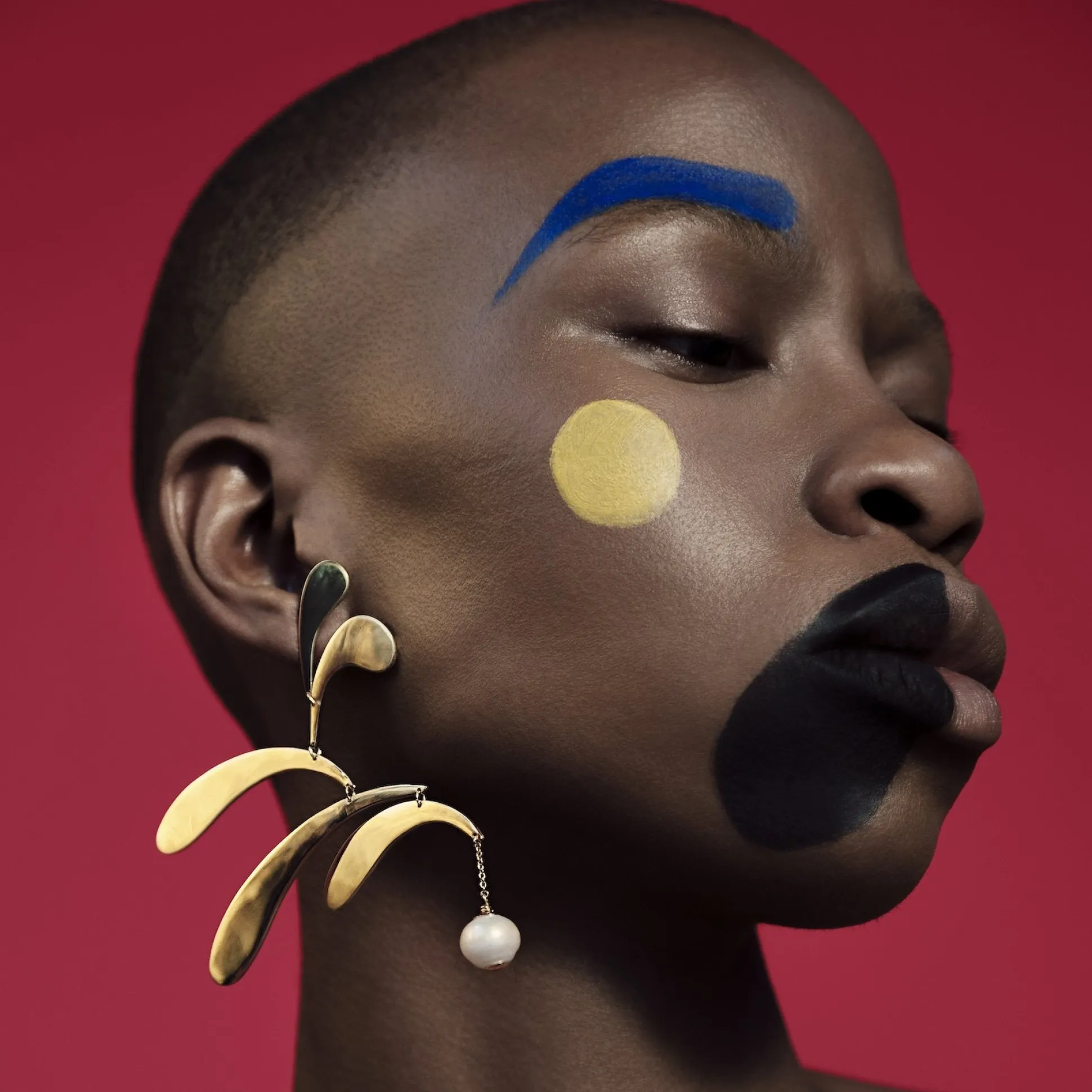 Boucle D'Oreille Mobile Dore